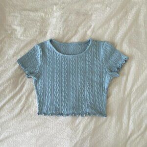 super cute light blue crop top w/ (cable) knit pattern